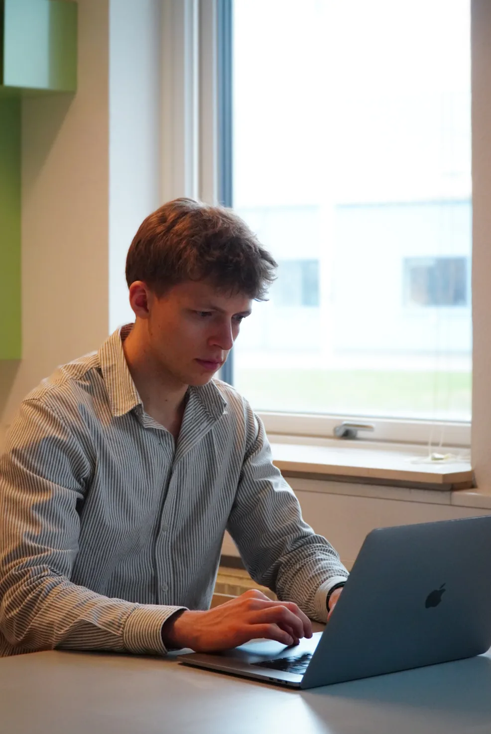 Lasse arbejder med AI-løsninger